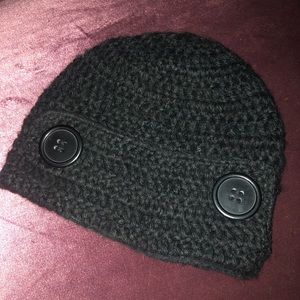 Black knit beanie with button accents